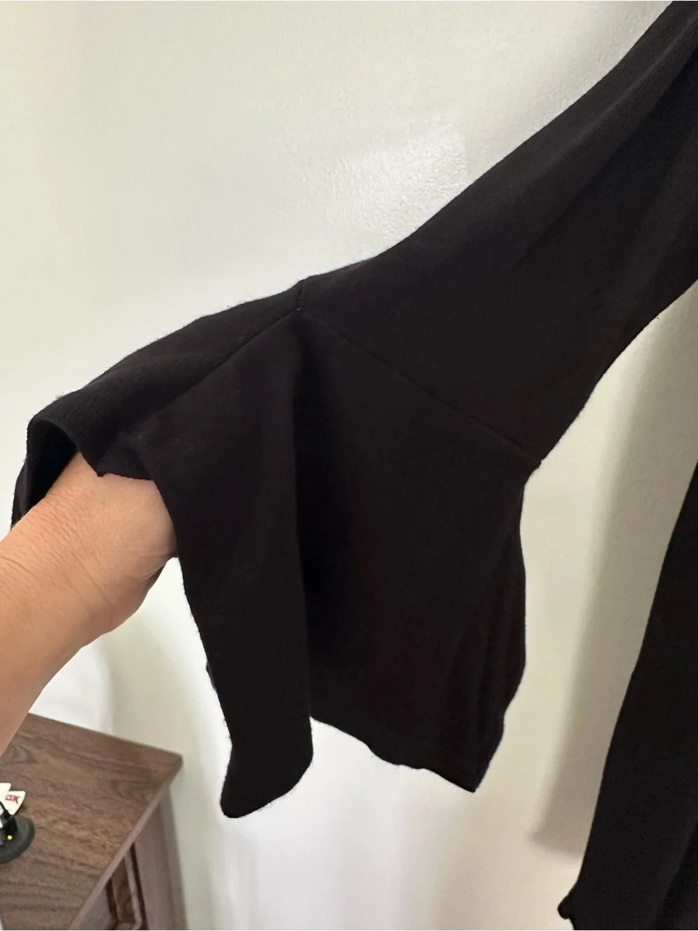 Chico's Black Open-Front tunic length Cardigan with tulip sleeves.